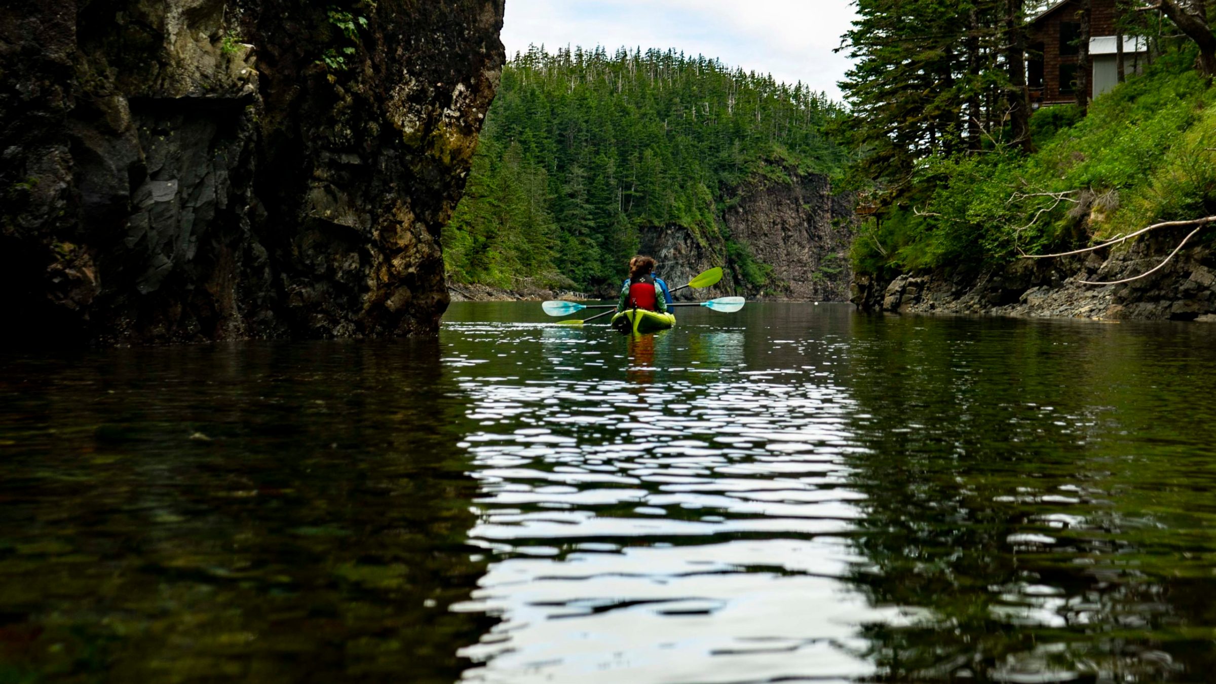 a person riding on top of a lake